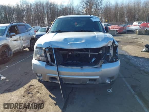 2014 Chevrolet Suburban LT with VIN 1GNSKJE75ER152008, listed as a IAAI auction lot 40938852 with 210,489 mi miles and . Bid and sale history available at DreamBid. Image 12.