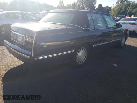 ✅ 1997 Cadillac DeVille • VIN: 1G6KD52Y7VU226200 • Lot: 69695724. Listed on Copart with 65,603 mi. Free auction sales archive from the USA and detailed vehicle history report at DreamBid. Image 3.