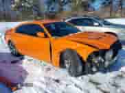 2014 Dodge Charger SXT with VIN 2C3CDXHG1EH219486, listed as a IAAI auction lot 41262265 with 117,949 mi miles and . Bid and sale history available at DreamBid. Image 1.