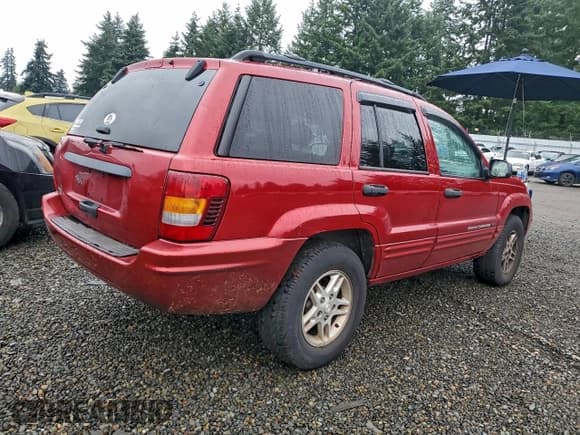 ✅ 2004 Jeep Grand Cherokee Laredo • VIN: 1J4GX48S74C321345 • Lot: 94482635. Listed on Copart with 138,396 mi. Free auction sales archive from the USA and detailed vehicle history report at DreamBid. Image 3.