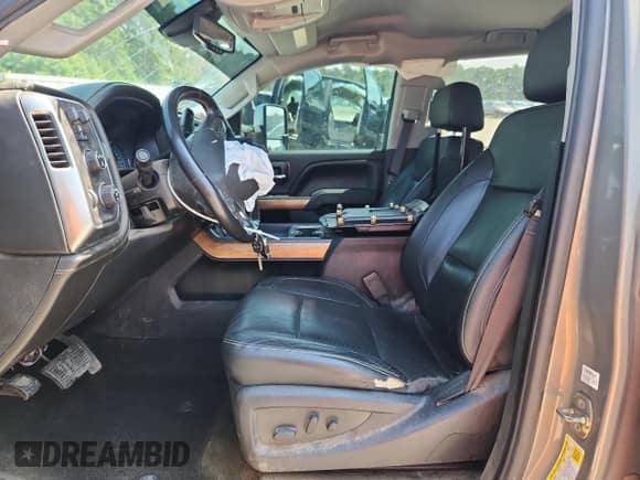 2017 Chevrolet Silverado 2500HD LTZ с VIN 1GC1KWEY4HF156440, выставлен на аукционе Copart как лот 71732905 с пробегом 180 327 миль миль и Списание • Salvage title. История ставок и продаж доступна на DreamBid. Изображение 7.