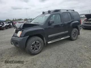 ✅ 2014 Nissan Xterra X • VIN: 5N1AN0NW7EN814588 • Lot: 80311645. Listed on Copart with 128,829 mi. Free auction sales archive from the USA and detailed vehicle history report at DreamBid. Image 1.