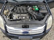 ✅ 2009 Ford Fusion SEL • VIN: 3FAHP08159R198900 • Lot: 89821295. Wystawiony na Copart z przebiegiem 141 061 mil. Bezpłatny archiwum sprzedaży aukcyjnych z USA i szczegółowy raport historii pojazdu na DreamBid. Zdjęcie 11.