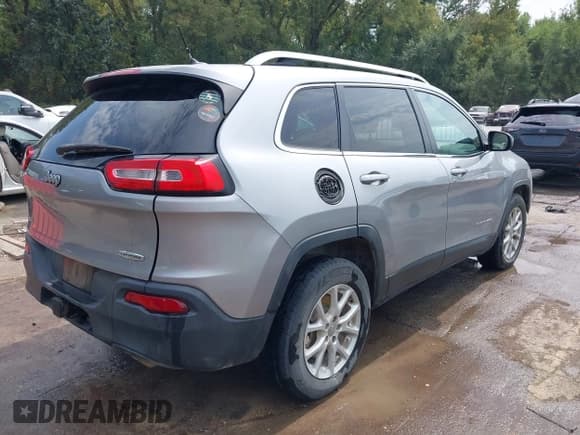 ✅ 2014 Jeep Cherokee Latitude • VIN: 1C4PJMCS2EW229882 • Lot: 43239899. Listed on IAAI with 162,635 mi. Free auction sales archive from the USA and detailed vehicle history report at DreamBid. Image 4.
