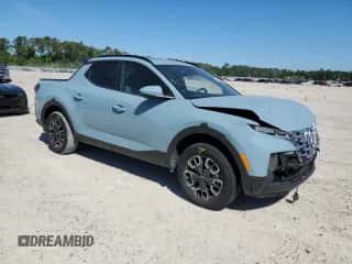 2023 Hyundai Santa Cruz SEL Premium z VIN 5NTJDDAF5PH055478, wystawiony jako Copart lot #49303904 z przebiegiem 2 690 mil mil oraz Szkoda całkowita • Salvage title. Historia ofert i sprzedaży dostępna na DreamBid. Obrazek 4.