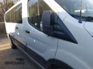 ✅ 2021 Ford Transit Passenger XL • VIN: 1FBAX2Y89MKA49850 • Лот: 41602893. Опубликован ранее на IAAI с пробегом 74 248 миль. Бесплатный доступ к архиву аукционных продаж из США и подробный отчёт об истории автомобиля на DreamBid. Изображение 13.
