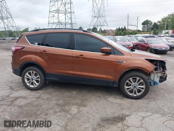 ✅ 2017 Ford Escape SE • VIN: 1FMCU9GD7HUD95311 • Lot: 42685526. Listed on IAAI with 95,785 mi. Free auction sales archive from the USA and detailed vehicle history report at DreamBid. Image 13.