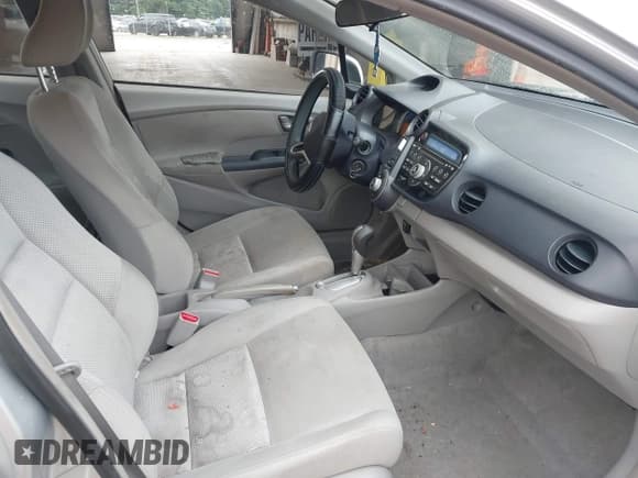 ✅ 2010 Honda Insight LX • VIN: JHMZE2H59AS011765 • Лот: 43062689. Опубликован ранее на IAAI с пробегом 318 431 миль. Бесплатный доступ к архиву аукционных продаж из США и подробный отчёт об истории автомобиля на DreamBid. Изображение 5.