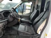 ✅ 2023 Ford Transit Cargo • VIN: 1FTBR1X8XPKB23061 • Lot: 58814525. Listed on Copart with 24,432 mi. Free auction sales archive from the USA and detailed vehicle history report at DreamBid. Image 7.