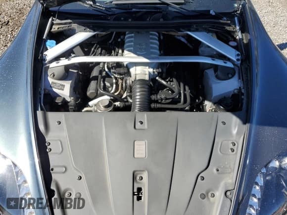 ✅ 2008 Aston Martin Vantage • VIN: SCFBF04B88GD08401 • Лот: 44961245. Опубликован ранее на Copart с пробегом 77 842 миль. Бесплатный доступ к архиву аукционных продаж из США и подробный отчёт об истории автомобиля на DreamBid. Изображение 11.