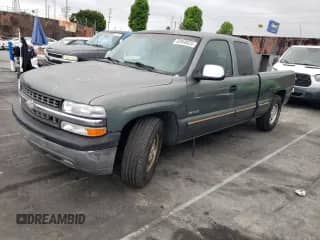 1999 Chevrolet Silverado 1500 LS with VIN 2GCEC19V5X1174646, listed as a Copart auction lot 55950825 with 165,977 mi miles and Salvage title. Bid and sale history available at DreamBid. Image 1.