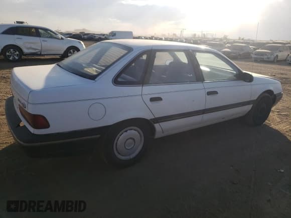 ✅ 1987 Ford Taurus • VIN: 1FABP50U4HG223140 • Лот: 76193014. Опубликован ранее на Copart с пробегом 7 795 миль. Бесплатный доступ к архиву аукционных продаж из США и подробный отчёт об истории автомобиля на DreamBid. Изображение 3.