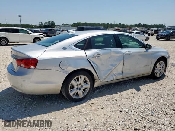 ✅ 2015 Chevrolet Impala LS • VIN: 1G11Z5SL3FU105320 • Lot: 71305375. Listed on Copart with 143,599 mi. Free auction sales archive from the USA and detailed vehicle history report at DreamBid. Image 3.