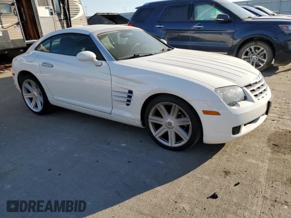 ✅ 2004 Chrysler Crossfire • VIN: 1C3AN69L94X002966 • Lot: 76795154. Listed on Copart with 14,235 mi. Free auction sales archive from the USA and detailed vehicle history report at DreamBid. Image 4.