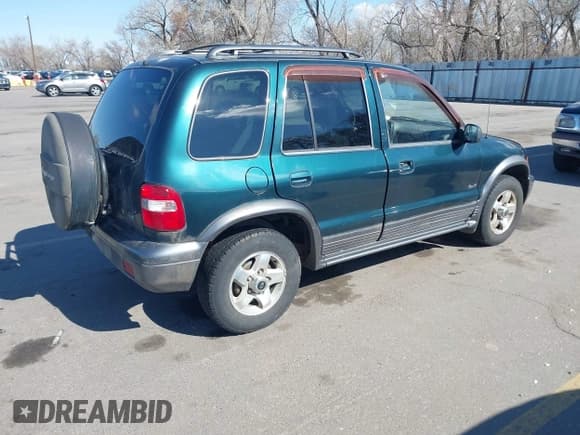 ✅ 2002 Kia Sportage • VIN: KNDJA723925120001 • Lot: 41931419. Listed on IAAI with 145,675 mi. Free auction sales archive from the USA and detailed vehicle history report at DreamBid. Image 4.