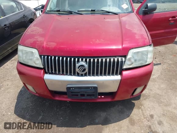 ✅ 2007 Mercury Mariner Luxury • VIN: 4M2YU81147KJ04027 • Лот: 42556878. Опубликован ранее на IAAI с пробегом 280 571 миль. Бесплатный доступ к архиву аукционных продаж из США и подробный отчёт об истории автомобиля на DreamBid. Изображение 6.
