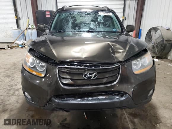 ✅ 2011 Hyundai Santa Fe SE • VIN: 5XYZHDAG8BG061824 • Lot: 77025964. Listed on Copart with 149,741 mi. Free auction sales archive from the USA and detailed vehicle history report at DreamBid. Image 5.