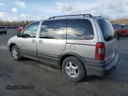 ✅ 2004 Pontiac Montana • VIN: 1GMDU03E44D242328 • Лот: 46984375. Опубликован ранее на Copart с пробегом 76 602 миль. Бесплатный доступ к архиву аукционных продаж из США и подробный отчёт об истории автомобиля на DreamBid. Изображение 2.
