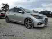 2020 Hyundai Accent Limited z VIN 3KPC34A69LE097998, wystawiony jako Copart lot #74094674 z przebiegiem 26 412 mil mil oraz Szkoda całkowita • Salvage title. Historia ofert i sprzedaży dostępna na DreamBid. Obrazek 4.