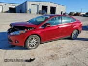 ✅ 2014 Ford Focus Titanium • VIN: 1FADP3J23EL259186 • Lot: 93946175. Listed on Copart with 173,444 mi. Free auction sales archive from the USA and detailed vehicle history report at DreamBid. Image 1.