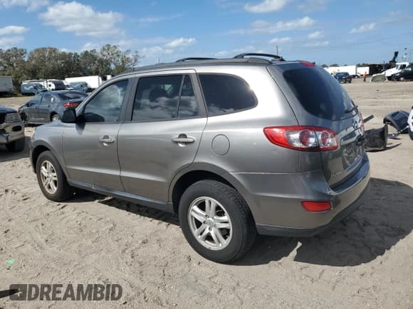 ✅ 2011 Hyundai Santa Fe GLS • VIN: 5XYZG3AB9BG016554 • Lot: 79357974. Listed on Copart with 144,047 mi. Free auction sales archive from the USA and detailed vehicle history report at DreamBid. Image 2.