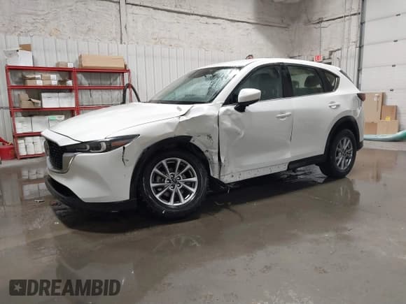 ✅ 2023 Mazda CX-5 S • VIN: JM3KFBAM3P0237118 • Лот: 41264600. Опубликован ранее на IAAI с пробегом 33 471 миль. Бесплатный доступ к архиву аукционных продаж из США и подробный отчёт об истории автомобиля на DreamBid. Изображение 2.