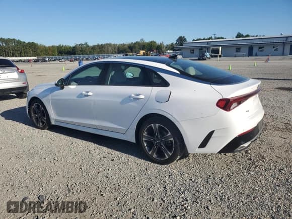 ✅ 2021 Kia K5 EX • VIN: 5XXG34J25MG033688 • Лот: 82343775. Опубликован ранее на Copart с пробегом 70 403 миль. Бесплатный доступ к архиву аукционных продаж из США и подробный отчёт об истории автомобиля на DreamBid. Изображение 2.