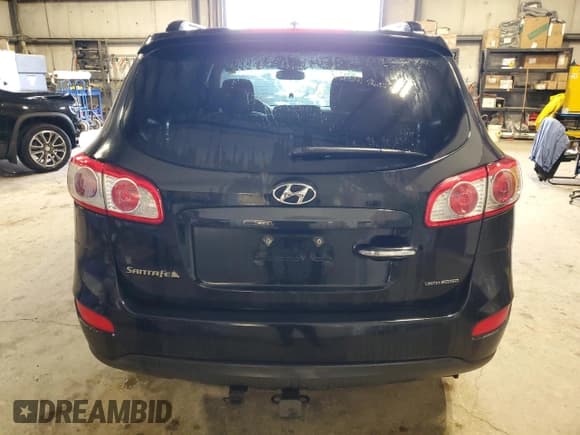 ✅ 2012 Hyundai Santa Fe SE • VIN: 5XYZHDAG0CG127901 • Lot: 63340214. Listed on Copart with 197,402 mi. Free auction sales archive from the USA and detailed vehicle history report at DreamBid. Image 6.