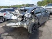 ✅ 2019 Chevrolet Cruze LT • VIN: 1G1BE5SMXK7110256 • Lot: 43357976. Listed on IAAI with 115,650 mi. Free auction sales archive from the USA and detailed vehicle history report at DreamBid. Image 4.