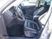 ✅ 2012 Volkswagen Tiguan LE • VIN: WVGAV7AX2CW580035 • Lot: 47297205. Listed on Copart with 118,211 mi. Free auction sales archive from the USA and detailed vehicle history report at DreamBid. Image 7.