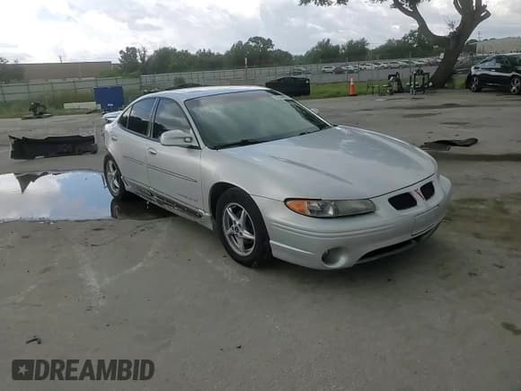 ✅ 2002 Pontiac Grand Prix GT • VIN: 1G2WP52KX2F257754 • Лот: 62646215. Опубликован ранее на Copart с пробегом 98 444 миль. Бесплатный доступ к архиву аукционных продаж из США и подробный отчёт об истории автомобиля на DreamBid. Изображение 14.