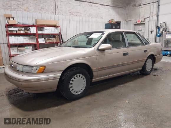 ✅ 1993 Ford Taurus GL • VIN: 1FALP52U1PG153869 • Lot: 43383973. Wystawiony na IAAI z przebiegiem 52 208 mil. Bezpłatny archiwum sprzedaży aukcyjnych z USA i szczegółowy raport historii pojazdu na DreamBid. Zdjęcie 2.