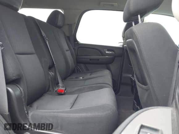 2011 Chevrolet Tahoe Commercial with VIN 1GNSK2E03BR326100, listed as a IAAI auction lot 42185277 with 158,183 mi miles and . Bid and sale history available at DreamBid. Image 8.