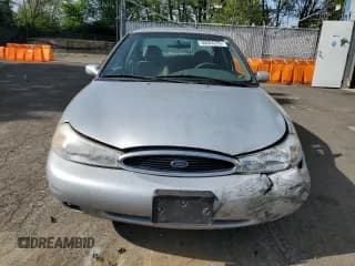 ✅ 1998 Ford Contour LX • VIN: 1FAFP66L2WK290948 • Lot: 56204295. Wystawiony na Copart z przebiegiem 76 307 mil. Bezpłatny archiwum sprzedaży aukcyjnych z USA i szczegółowy raport historii pojazdu na DreamBid. Zdjęcie 5.
