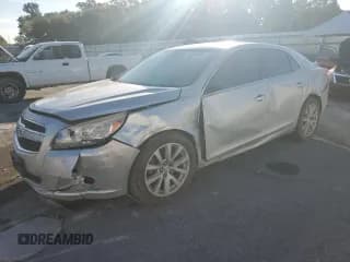 ✅ 2013 Chevrolet Malibu LT • VIN: 1G11E5SAXDF310290 • Lot: 82243565. Listed on Copart with 138,815 mi. Free auction sales archive from the USA and detailed vehicle history report at DreamBid. Image 1.