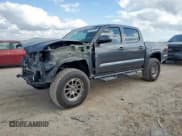 ✅ 2023 Toyota Tacoma SR • VIN: 3TYCZ5AN4PT153874 • Лот: 92057885. Опубликован ранее на Copart с пробегом 17 831 миль. Бесплатный доступ к архиву аукционных продаж из США и подробный отчёт об истории автомобиля на DreamBid. Изображение 1.
