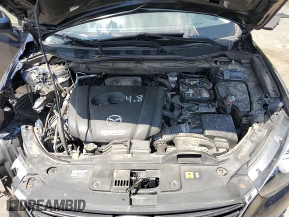 ✅ 2016 Mazda CX-5 Grand Touring • VIN: JM3KE4DY1G0885876 • Lot: 61382575. Listed on Copart with 124,491 mi. Free auction sales archive from the USA and detailed vehicle history report at DreamBid. Image 12.