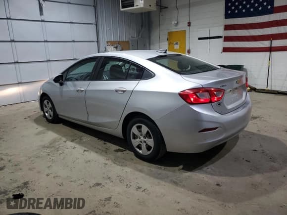 ✅ 2017 Chevrolet Cruze LS • VIN: 1G1BC5SM9H7223873 • Lot: 57317035. Listed on Copart with 123,623 mi. Free auction sales archive from the USA and detailed vehicle history report at DreamBid. Image 2.