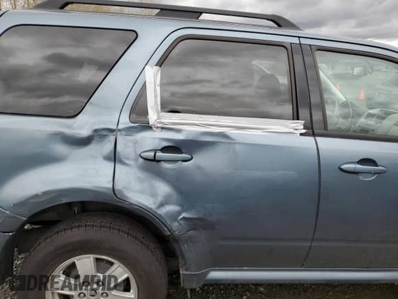 2011 Mercury Mariner z VIN 4M2CN8B76BKJ06364, wystawiony jako Copart lot #50040745 z przebiegiem 153 675 mil mil oraz Szkoda całkowita • Salvage title. Historia ofert i sprzedaży dostępna na DreamBid. Obrazek 11.