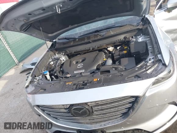 ✅ 2021 Mazda CX-9 Carbon Edition • VIN: JM3TCBDY2M0536669 • Лот: 41674709. Опубликован ранее на IAAI с пробегом 39 342 миль. Бесплатный доступ к архиву аукционных продаж из США и подробный отчёт об истории автомобиля на DreamBid. Изображение 10.