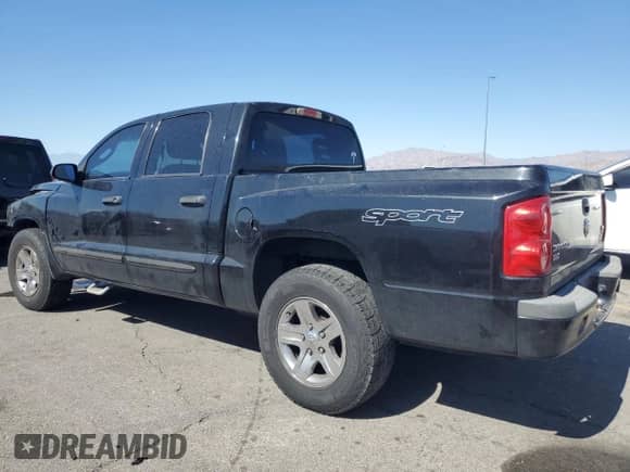 2006 Dodge Dakota SLT z VIN 1D7HE48N76S688934, wystawiony jako Copart lot #75057094 z przebiegiem 235 087 mil mil oraz Szkoda całkowita • Salvage title. Historia ofert i sprzedaży dostępna na DreamBid. Obrazek 2.