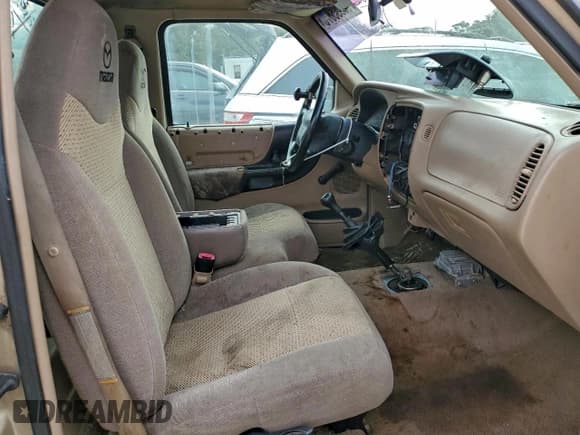 ✅ 1999 Mazda B-Series SX • VIN: 4F4YR12C7XTM22336 • Lot: 93998875. Listed on Copart with 304,120 mi. Free auction sales archive from the USA and detailed vehicle history report at DreamBid. Image 10.