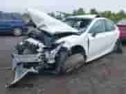 2022 Toyota Camry LE с VIN 4T1C11BK2NU072800, выставлен на аукционе IAAI как лот 43281636 с пробегом 21 979 миль миль и . История ставок и продаж доступна на DreamBid. Изображение 18.