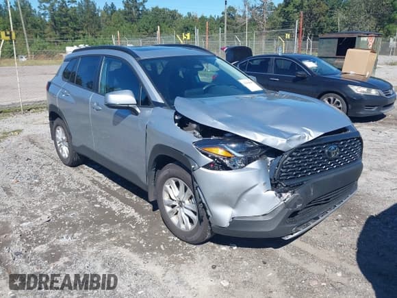 ✅ 2024 Toyota Corolla Cross LE • VIN: 7MUBAAAG8RV114562 • Lot: 43444645. Listed on IAAI with 21,058 mi. Free auction sales archive from the USA and detailed vehicle history report at DreamBid. Image 1.