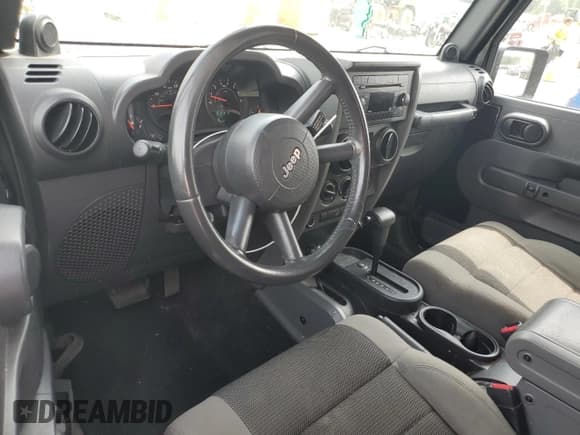 ✅ 2007 Jeep Wrangler X • VIN: 1J4FA24127L169350 • Lot: 67050545. Listed on Copart with 183,610 mi. Free auction sales archive from the USA and detailed vehicle history report at DreamBid. Image 8.
