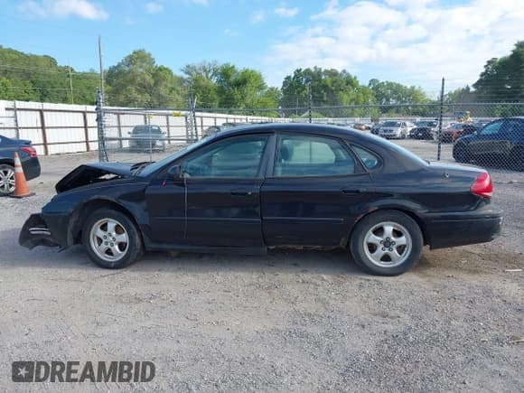 ✅ 2004 Ford Taurus SE • VIN: 1FAFP53284G179777 • Lot: 43053159. Wystawiony na IAAI z przebiegiem Nie podano. Bezpłatny archiwum sprzedaży aukcyjnych z USA i szczegółowy raport historii pojazdu na DreamBid. Zdjęcie 15.