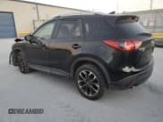 ✅ 2016 Mazda CX-5 Grand Touring • VIN: JM3KE4DY0G0639787 • Lot: 86552235. Wystawiony na Copart z przebiegiem 118 714 mil. Bezpłatny archiwum sprzedaży aukcyjnych z USA i szczegółowy raport historii pojazdu na DreamBid. Zdjęcie 2.