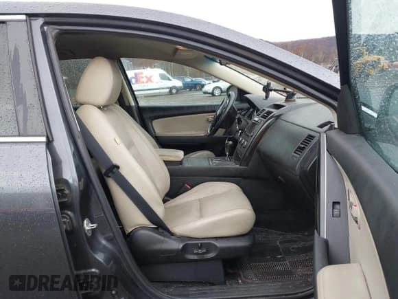 ✅ 2015 Mazda CX-9 Touring • VIN: JM3TB3CV0F0460596 • Lot: 43662804. Listed on IAAI with 143,368 mi. Free auction sales archive from the USA and detailed vehicle history report at DreamBid. Image 5.