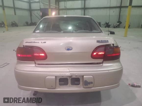 2003 Chevrolet Malibu LS z VIN 1G1NE52J03M675783, wystawiony jako Copart lot #83032764 z przebiegiem 185 343 mil mil oraz Nie do naprawy • Non repairable. Historia ofert i sprzedaży dostępna na DreamBid. Obrazek 6.
