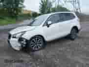 2018 Subaru Forester Touring z VIN JF2SJGWC3JH607000, wystawiony jako IAAI lot #42664722 z przebiegiem 30 857 mil mil oraz . Historia ofert i sprzedaży dostępna na DreamBid. Obrazek 2.